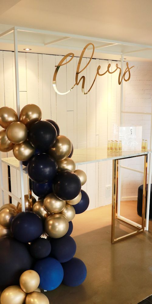 navy gold placesetting showroom L