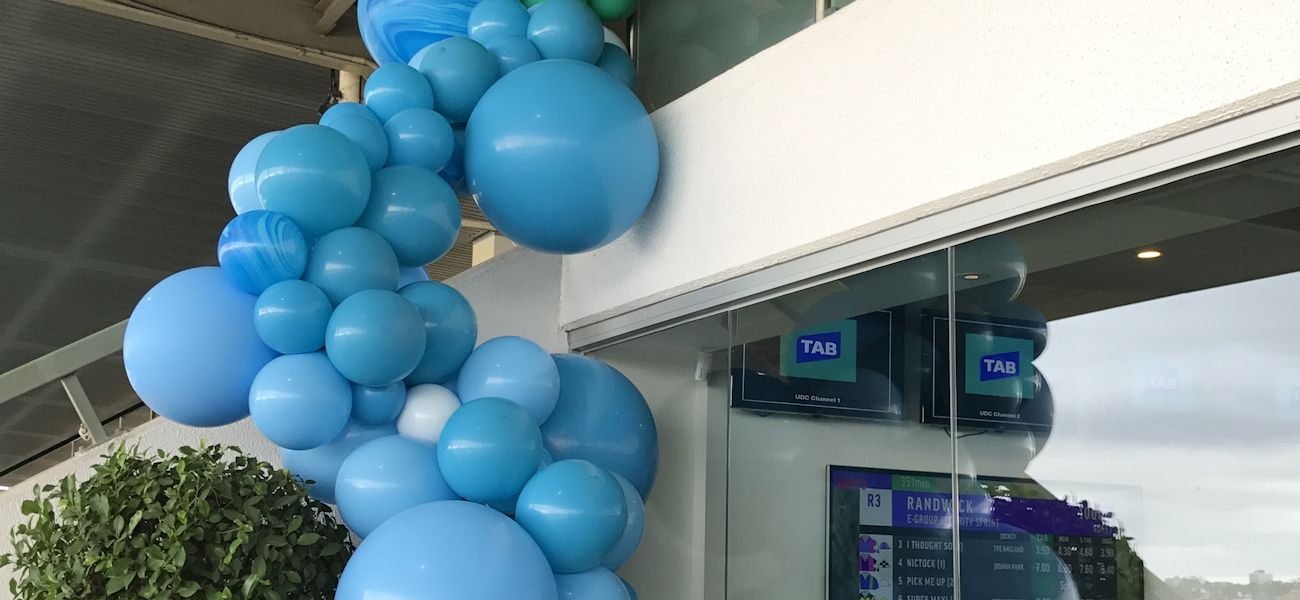 store opening blue balloon garland